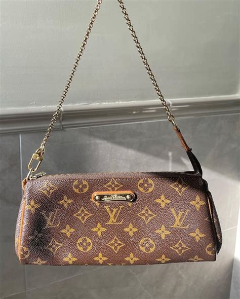 louis vuitton eva clutch new.